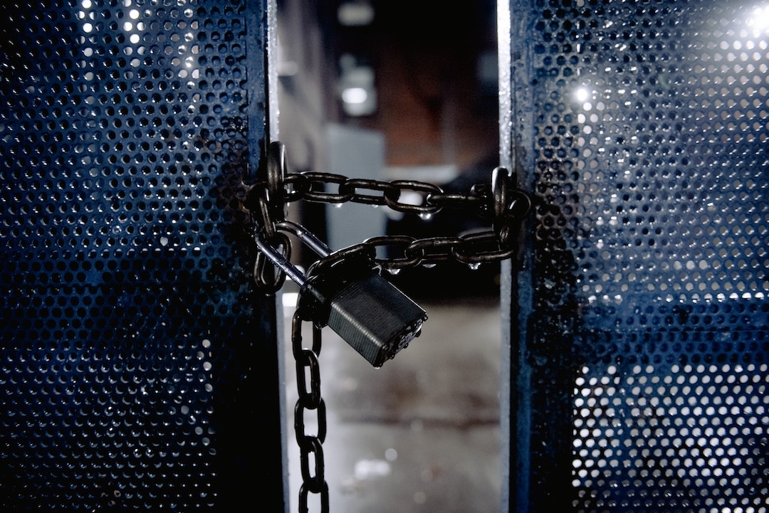 Seing through a locked gate - Photo by Harrison Haines from Pexels