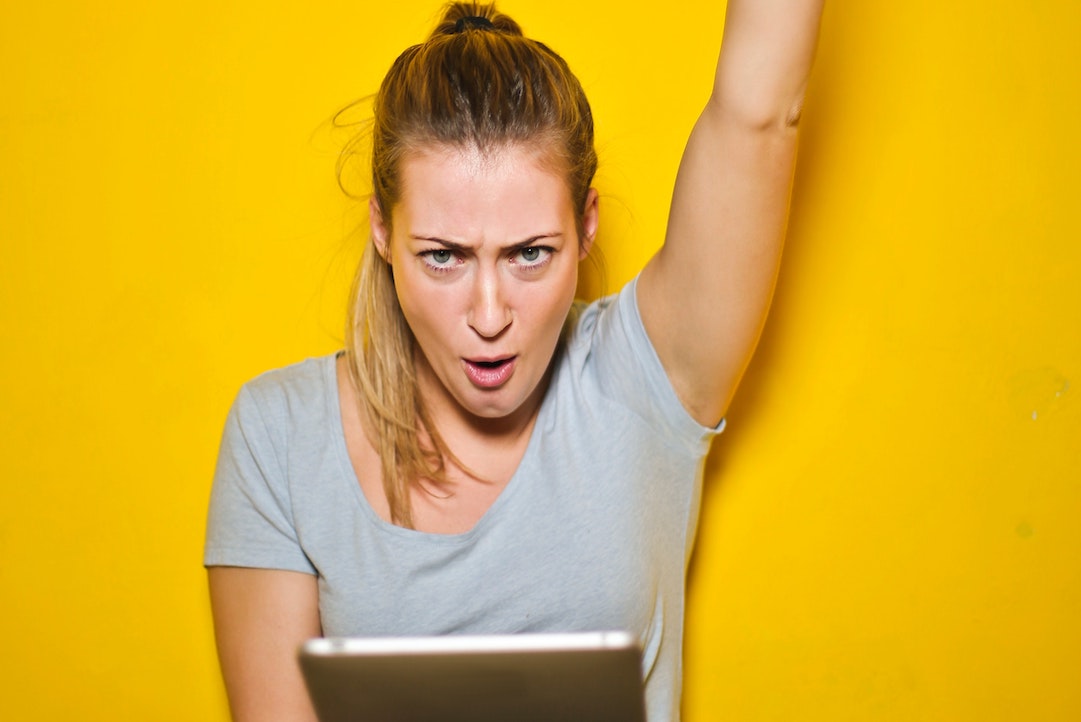 Woman celebrating - Photo by Andrea Piacquadio from Pexels