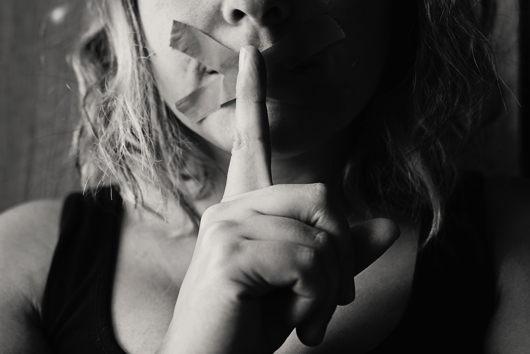 No reply: mouth closed by tape - Photo by Kat Smith - Pexels