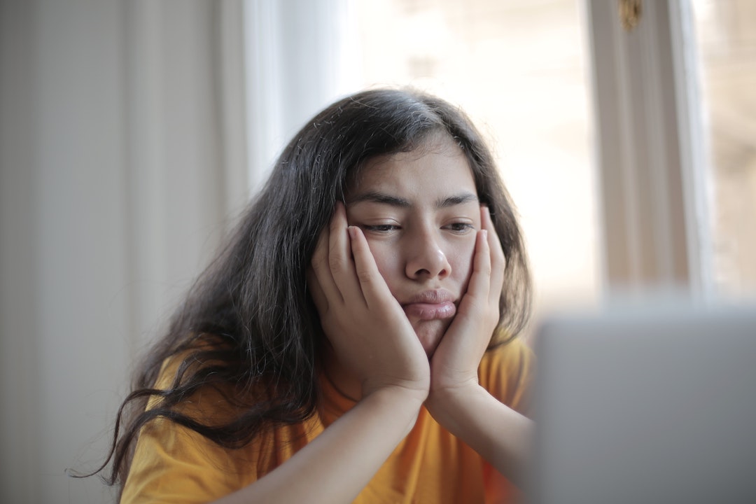 People don't like my emails - Disappointed woman in front of a computer